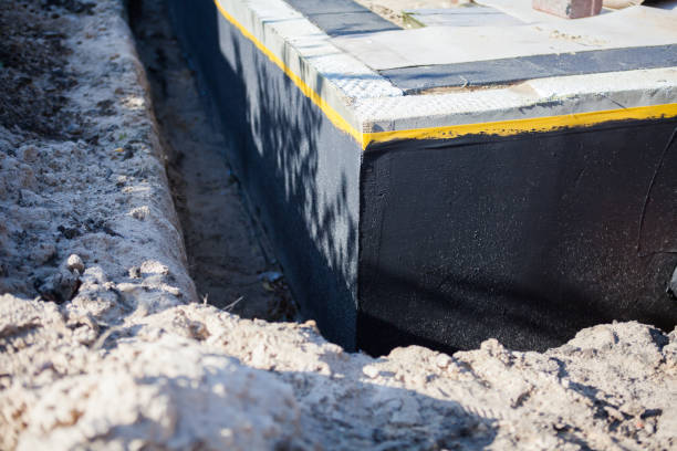 Professional Basement Waterproofing technician working in Lakeview, NY